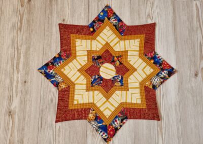 weihnachtliches Deckerl in Sternform